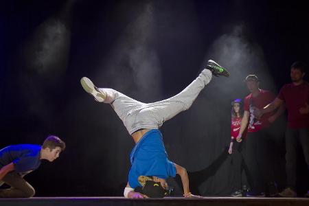 Which of the following elements is NOT part of the hip-hop culture that breakdancing emerged from?