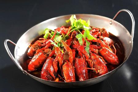 Which cuisine is known for its spicy flavors?