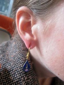 What is the term used for earrings that do not require pierced ears?
