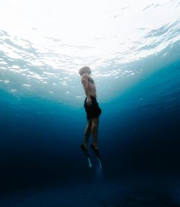What is the term for swimming under the water's surface?