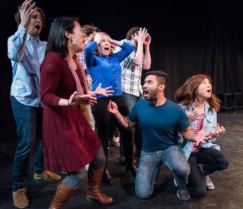 What is 'Yes, and...' in improvisational theater?