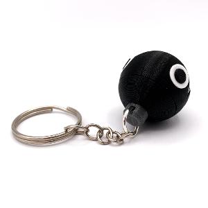 What is the purpose of a bag charm or keychain accessory?