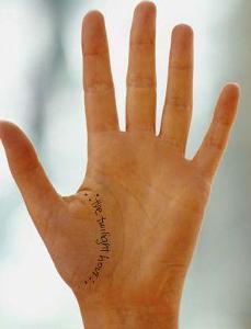 How does Bella get the crescent scar on her hand?