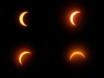 What causes a solar eclipse?