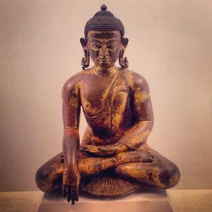 Which ancient Chinese religion incorporates the teachings of Siddhartha Gautama?