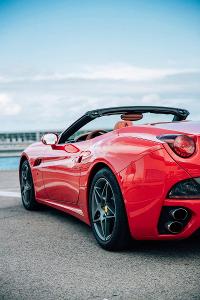 Which country is home to the world-famous sports car manufacturer Ferrari?