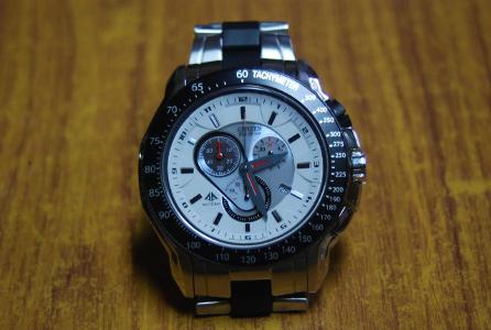 What is the purpose of a tachymeter scale on a watch?