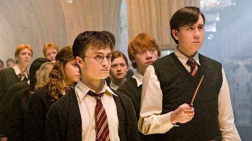 How much older is Neville Longbottom than Harry Potter?