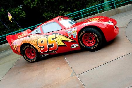 Which Pixar film is about a race car named Lightning McQueen?