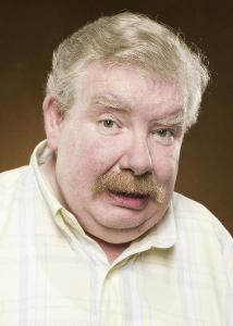 Where does  Vernon Dursley work at?