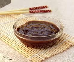 "Hoisin sauce is a thick, fragrant sauce commonly used in Chinese cuisine as a glaze for meat, an addition to stir fries, or as dipping sauce. It is darkly colored in appearance and sweet and salty in taste." Wikipedia.