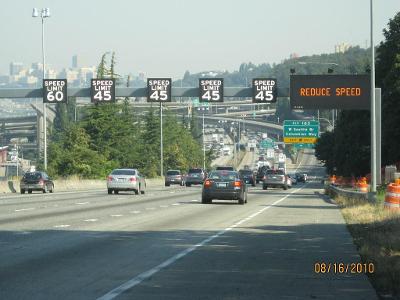 What should you do if you miss your intended highway exit?