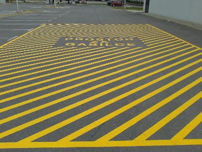 What does a solid yellow line indicate on the road?