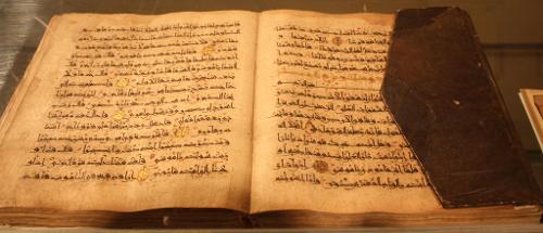 What is the original language of the Quran?