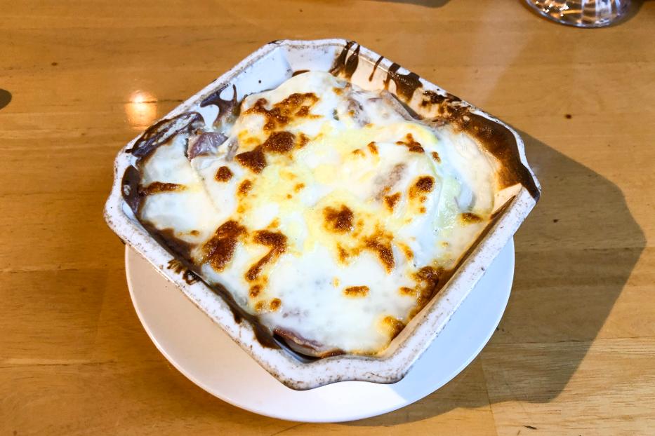 What dish is made with a creamy white sauce?