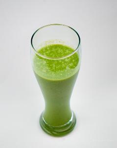 Which fruit is often used as a base for green smoothies?