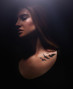 What does Tris's first tattoo mean?