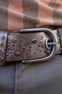 What is the primary purpose of a grommet belt?