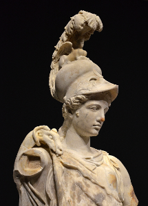 Which Greek goddess was the protector of wisdom, handicrafts, and warfare?