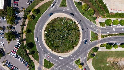 Which of the following should you do in a roundabout?