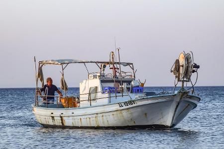 Which type of fishing boat is specifically designed for deep-sea fishing?