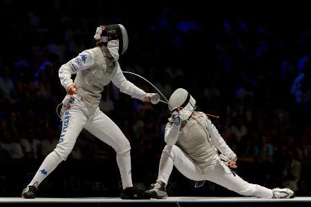 Which piece of protective gear is mandatory for modern fencing?