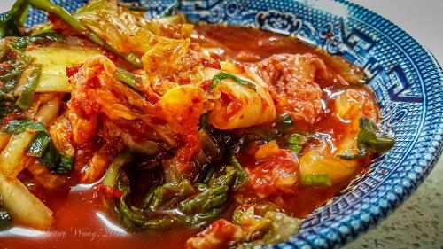 What is the popular Korean dish of spicy fermented vegetables?