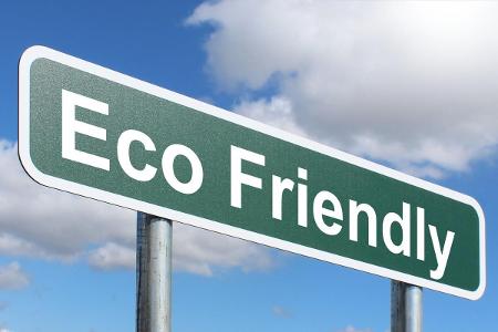 How can you adopt eco-friendly driving habits when planning a trip?