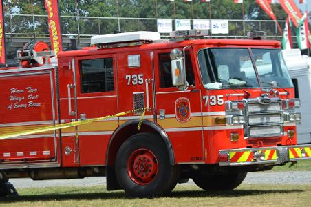 Which type of truck is specially designed for extinguishing fires and carrying firefighting equipment?