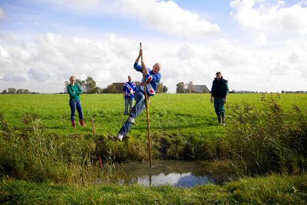 What is traditional sport of a Frisian minority in the West Friesland, Netherlands?