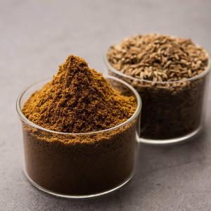 Which cuisine is known for its use of spices like cumin, coriander, and turmeric?