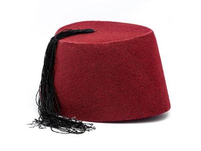 What is the name of the hat typically worn by members of the clergy?