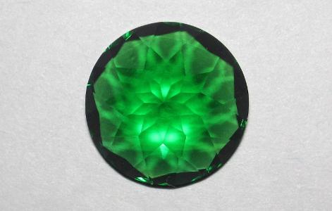 Which gemstone is known for its deep green color?