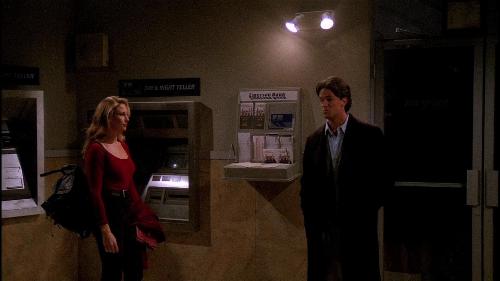 During the blackout, who was Chandler locked in with at the ATM Vestibule?