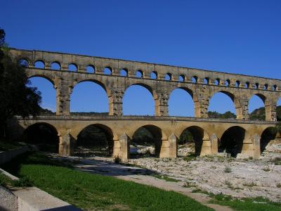 What architectural structure did the Romans develop to bring water to their cities?
