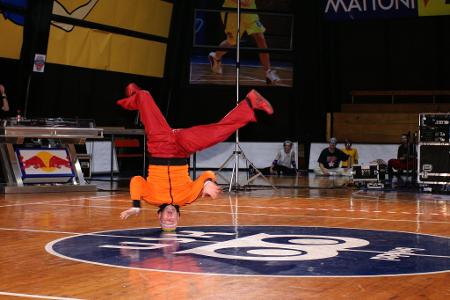 What is the correct term for a breakdancing move also known as a headspin?