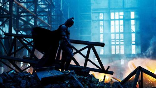 Who directed 'The Dark Knight' trilogy starring Christian Bale as Batman?