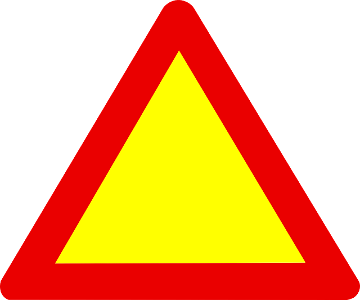 What does a red triangle road sign indicate?