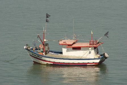 Which type of fishing boat is designed for overnight stays on the water?