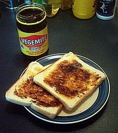 Vegemite Ah, Vegemite, the classic spread Australians like to tease foreigners with. Made from concentrated yeast extract, the Vegemite has a strong flavour that is hard to describe. It is usually eaten on toast, or in a sandwich with cheese. Remember to spread it THINLY. (i'm looking at you, America.)