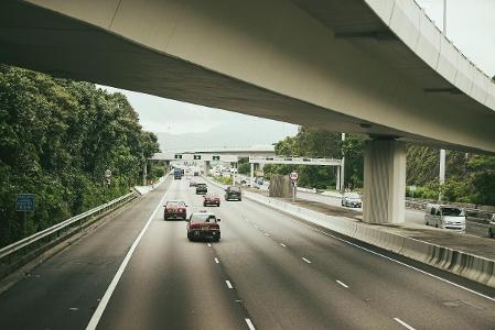 When overtaking another vehicle, which direction should you take your vehicle?