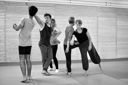 What is the purpose of a 'contact improvisation' in contemporary dance?