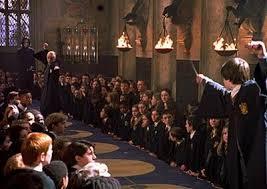 What was the name of the Hogwarts student who after seeing Harry using parseltounge talking to a snake at the dueling club believed that Harry was the air of Slytherin and was planning on attacking next?