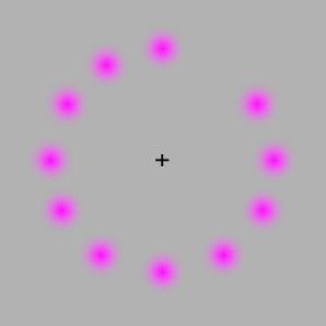 Stare a the cross of the picture, what happens to the pink dots?