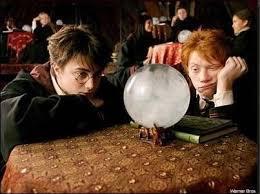 What grade did harry and ron get in divination?