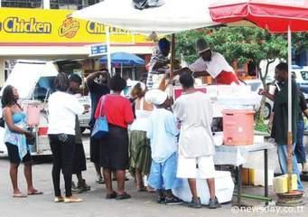 The picture below shows a doubles vendor,the type of business can be classified as: