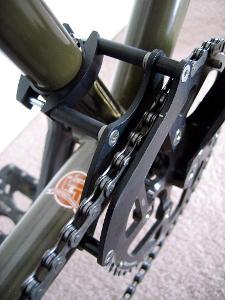 What is the purpose of a chain guide on a mountain bike?