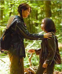 When Rue died, Katniss sang which song to her?