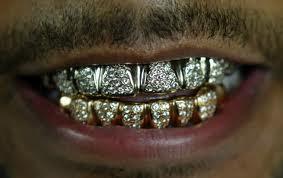 Which of these rappers have grills?