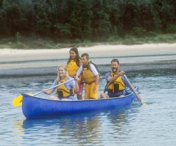 What are you most likely to do while paddling a canoe with friends?
